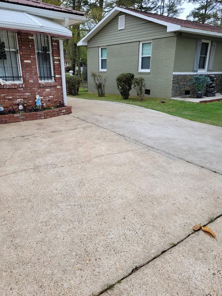 Freshly pressure washed concrete driveway